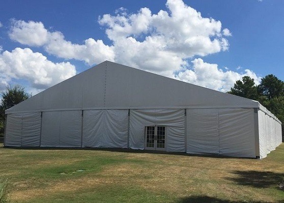 clearspan tent with white sidewalls and french doors