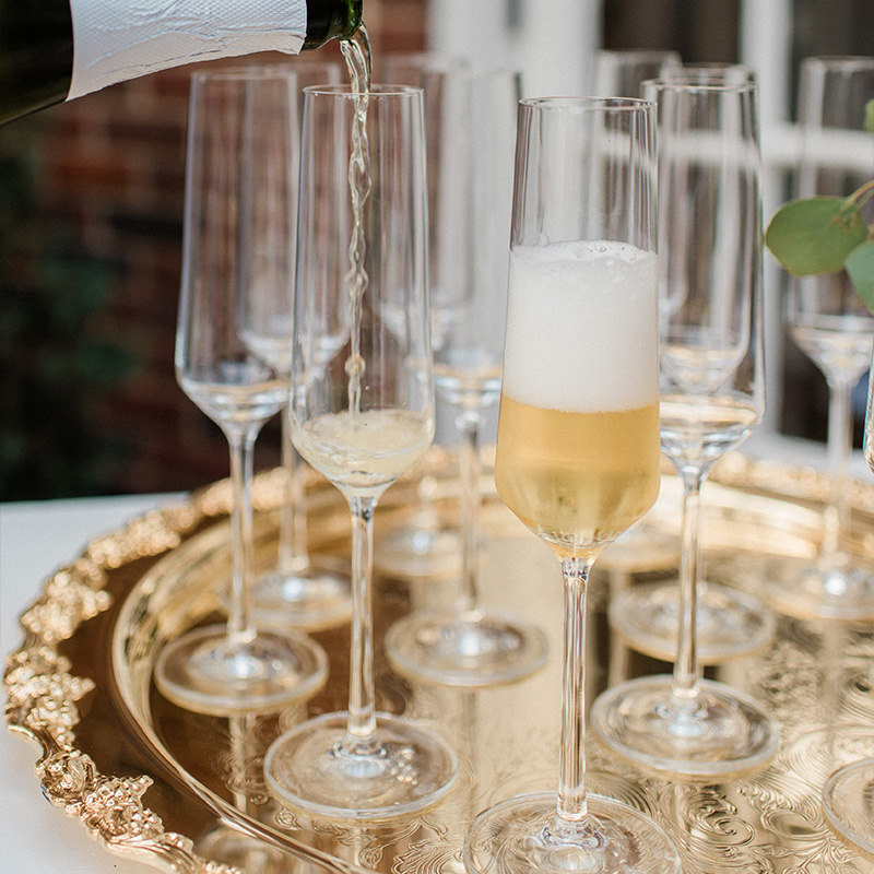 https://premiereeventsonline.com/wp-content/uploads/2020/07/Ornate-Gold-Tray-20in-Pure-Champagne-Flute-Patti-Darby-Photography.jpg