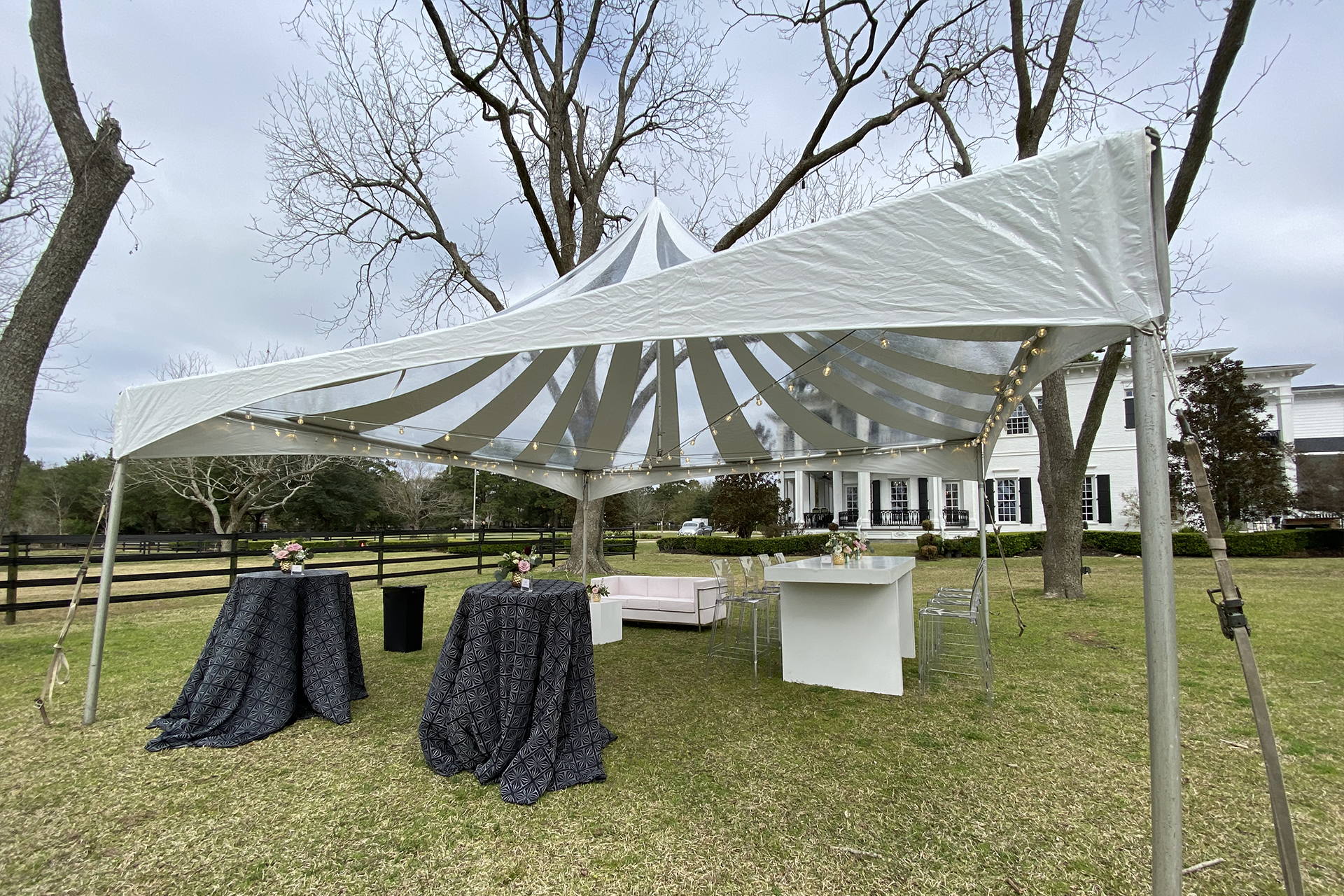 Contact Us Static Slider Image of Stargazer tent and black and white lounge rentals