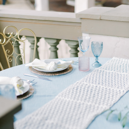 Gold Metal Garden Chair, Samantha Rose Gold Charger, Blue and Pink Glassware, Macrame Table Runner, Panama Sky
