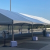 Pedestal Fans, Evaporative Cooler, and Concrete Blocks with White Covers