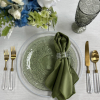 GLASS CHARGER WITH WHITE RIM, MARIA FERN DINNER PLATE, PRISM GOLD FLATWARE, BIJOU OAKMOSS GOBLET